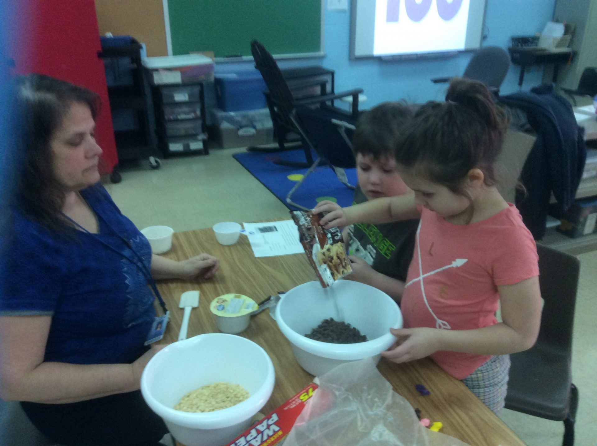 jean lawson cooking with students in a classroom