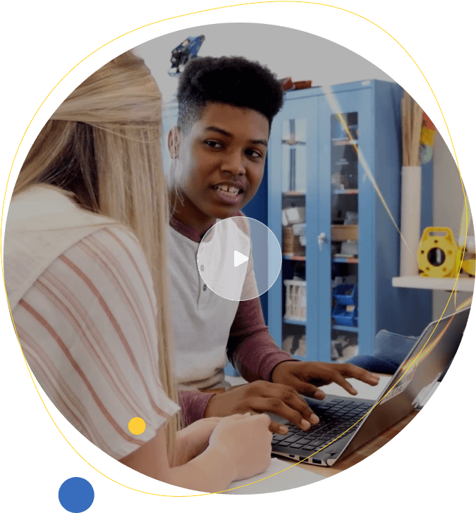 African American student on laptop with teacher