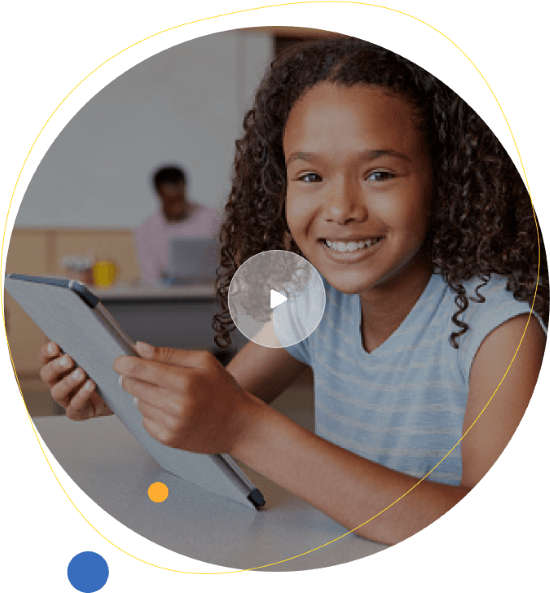 African american girl smiling in class on tablet
